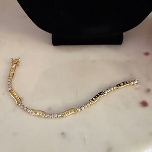 Gold-Tone Love Hope Faith Bracelet with the silver tone design feature